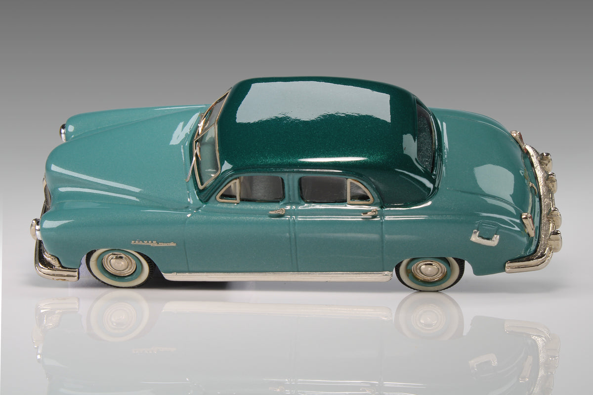 1949 Frazer Manhattan 4 DR Sedan by Conquest Models in Ocean Spray Green Met./Blade Green Met., CON 36.
Excellent condition, but rear license plate is missing. Original box is included in good condition, but the original foam is missing. It will be replaced with substitute foam. Material: white metal.
This is an adult collectible, and is not intended for children.
Ships to US addresses only.