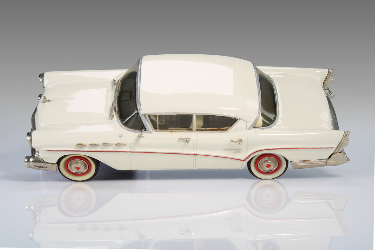 1957 Buick Roadmaster 75 Riviera HT by Conquest Models in Dover White, CON 07.

Excellent condition, but front license plate is missing. Original box and original foam are included and in good condition. Material: white metal.

This is an adult collectible, and is not intended for children.

Ships to US addresses only.