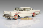 1957 Buick Roadmaster 75 Riviera HT by Conquest Models in Dover White, CON 07.

Excellent condition, but front license plate is missing. Original box and original foam are included and in good condition. Material: white metal.

This is an adult collectible, and is not intended for children.

Ships to US addresses only.